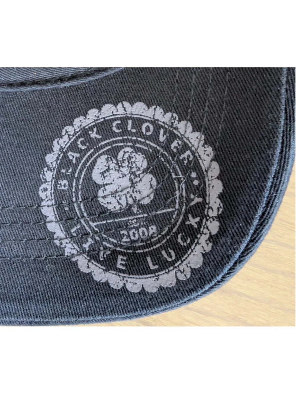 Black Clover Women's Black Baseball Cap with Green Shamrock Live Lucky Golf